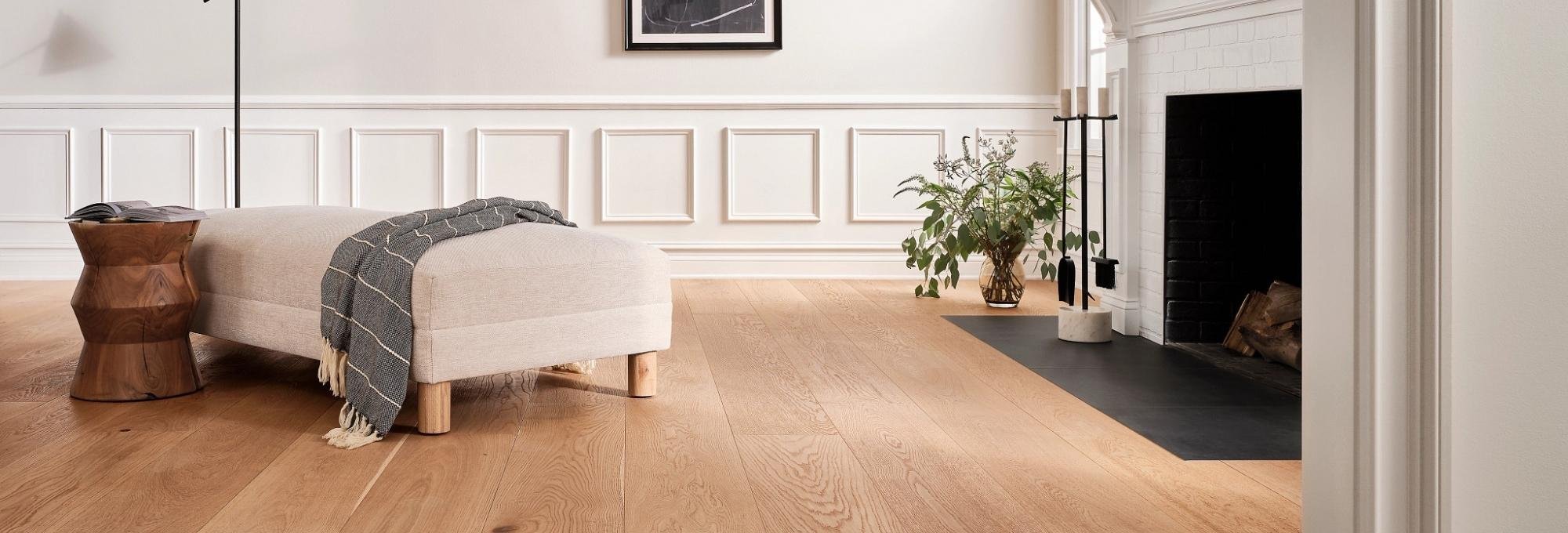 Beautiful hardwood flooring installed in a bright, modern living room